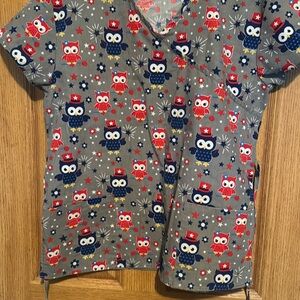 6 women’s scrub shirts, all sized small. Different brands and colors